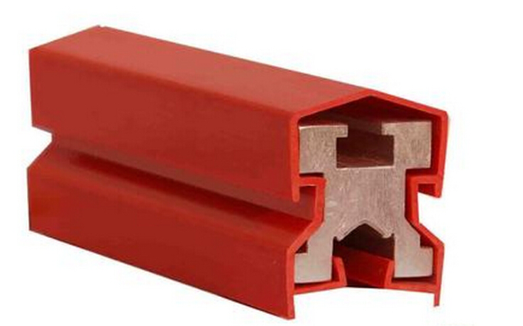 Red rubber-coated metal rail profile shown at an angle, studio product shot on white background